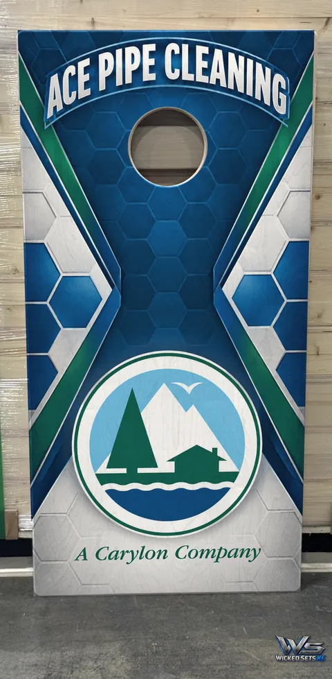 Custom board for Ace Pipe Cleaning with company logo on blue and green hexagons